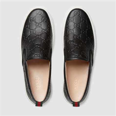 gucci slip on white|Gucci embossed slip on shoes.